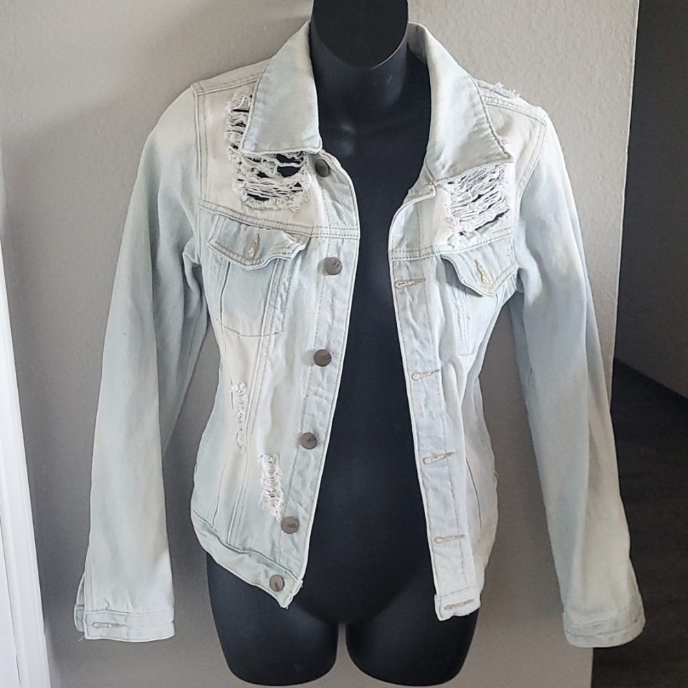 Fashion nova light blue distressed Jean jacket.